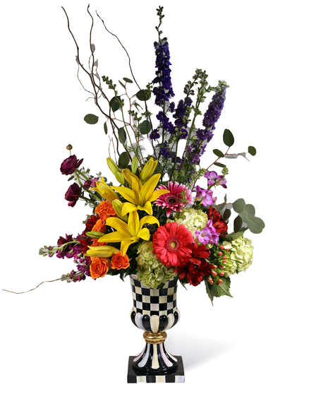 Large Mackenzie Childs Vase with flower arrangement